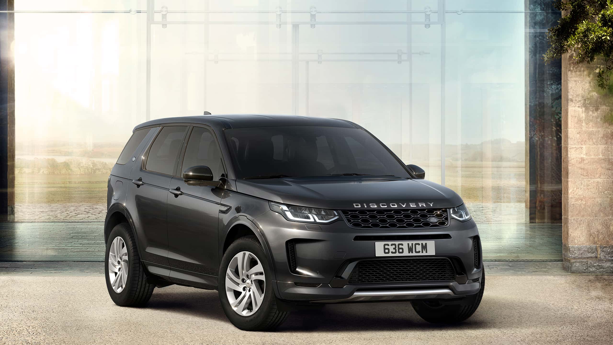 Discovery Sport outside of glass house
